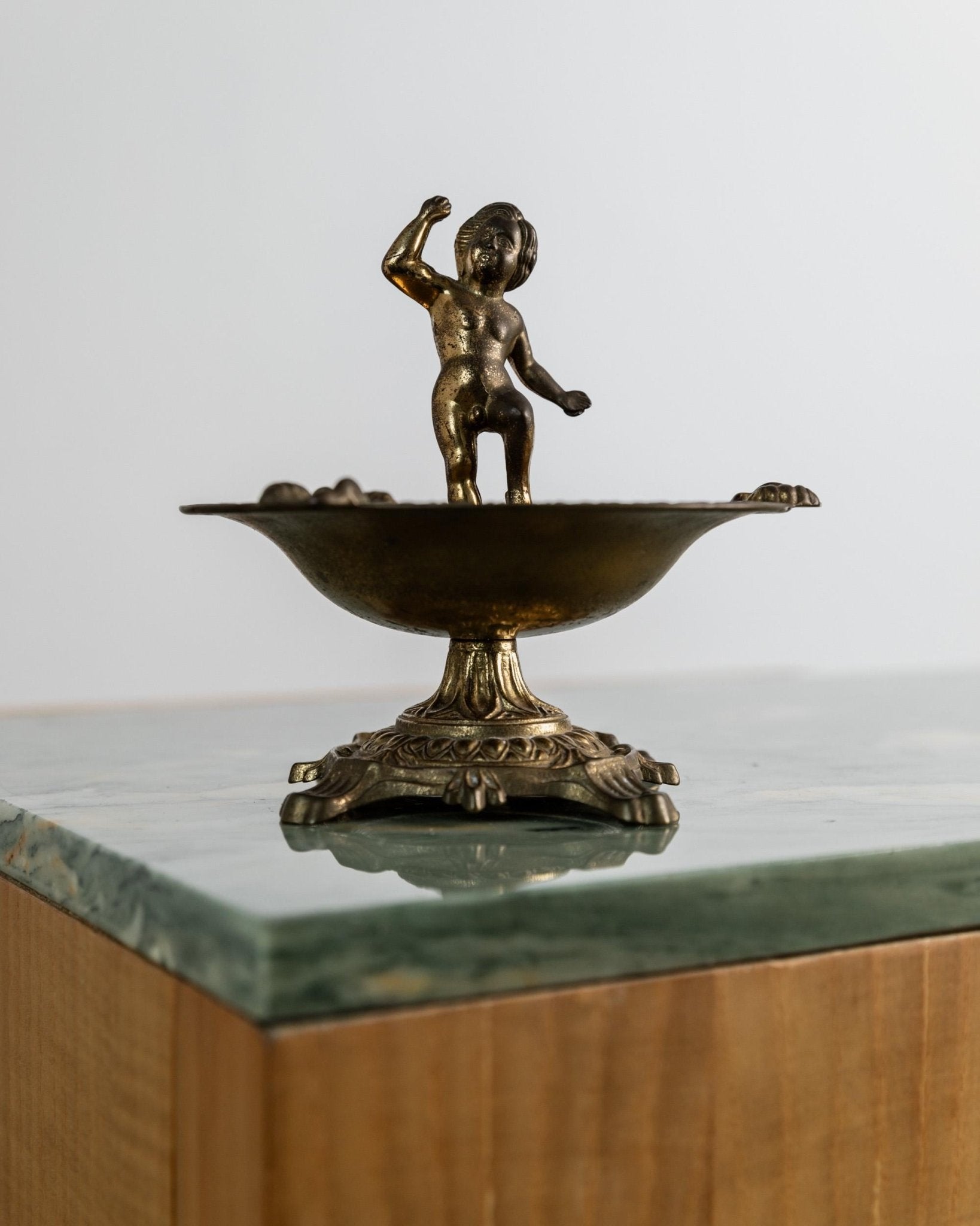 Vintage 1940s Brass Ashtray, Nude Boy Figurine on Footed Base, Romantic Sculptural Design, Decorative Table Accent, Elegant Gift Idea_Bottega Jacobs