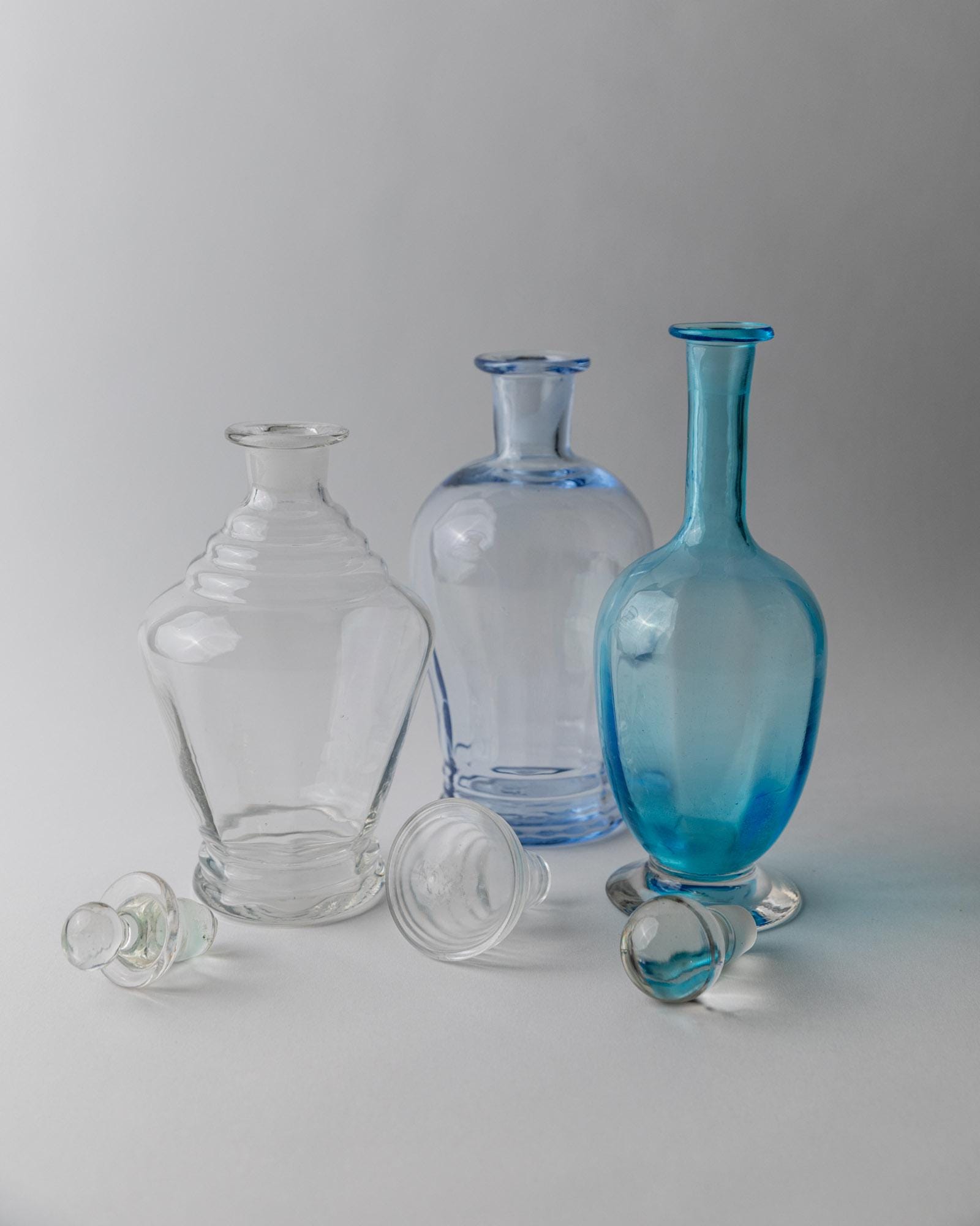 Vintage 1950s Murano Glass Decanter Set of 3, Blue and Clear Art Glass with Stoppers, Different Sculptural Shapes, Italian Decor, Gift Idea_Bottega Jacobs