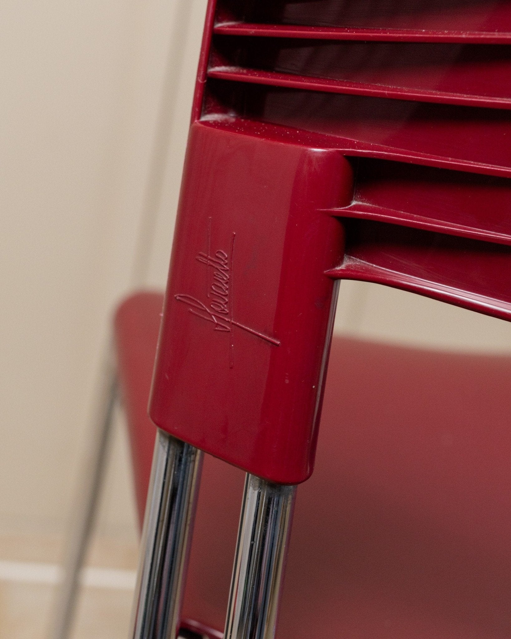 Vintage 1980s Dining chair by Paolo Favaretto for Assisa, stckable Design Italy 1986 - chrome and plastic in red - design classic_Bottega Jacobs