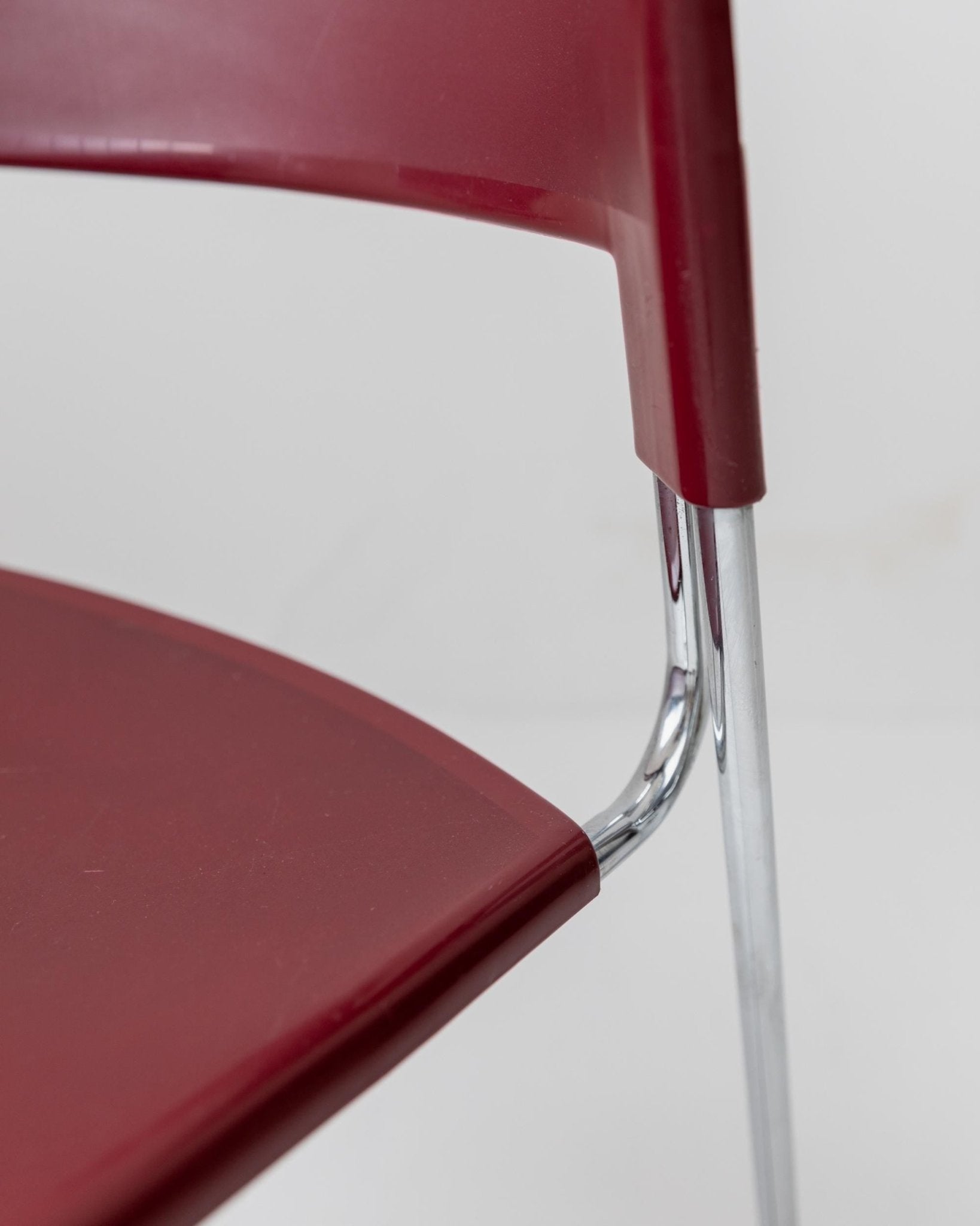 Vintage 1980s Dining chair by Paolo Favaretto for Assisa, stckable Design Italy 1986 - chrome and plastic in red - design classic_Bottega Jacobs