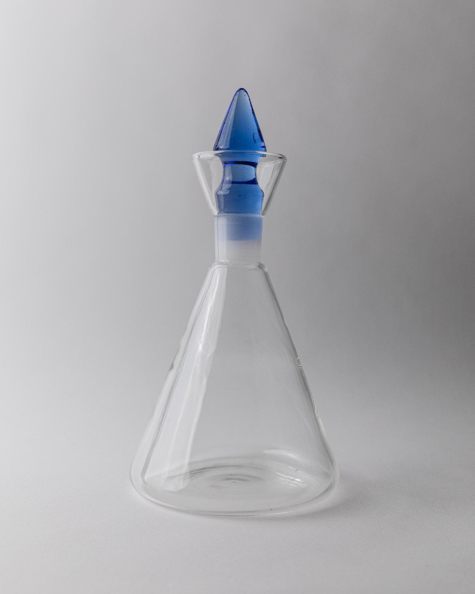 Vintage 1980s Glass Decanter Set of 2, Clear Glass with pink, blue Stoppers, Different Sculptural Shapes, Bar Accessory, Elegant Gift Idea_Bottega Jacobs