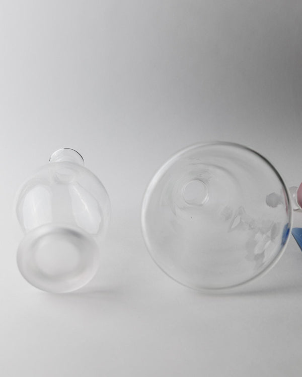 Vintage 1980s Glass Decanter Set of 2, Clear Glass with pink, blue Stoppers, Different Sculptural Shapes, Bar Accessory, Elegant Gift Idea_Bottega Jacobs