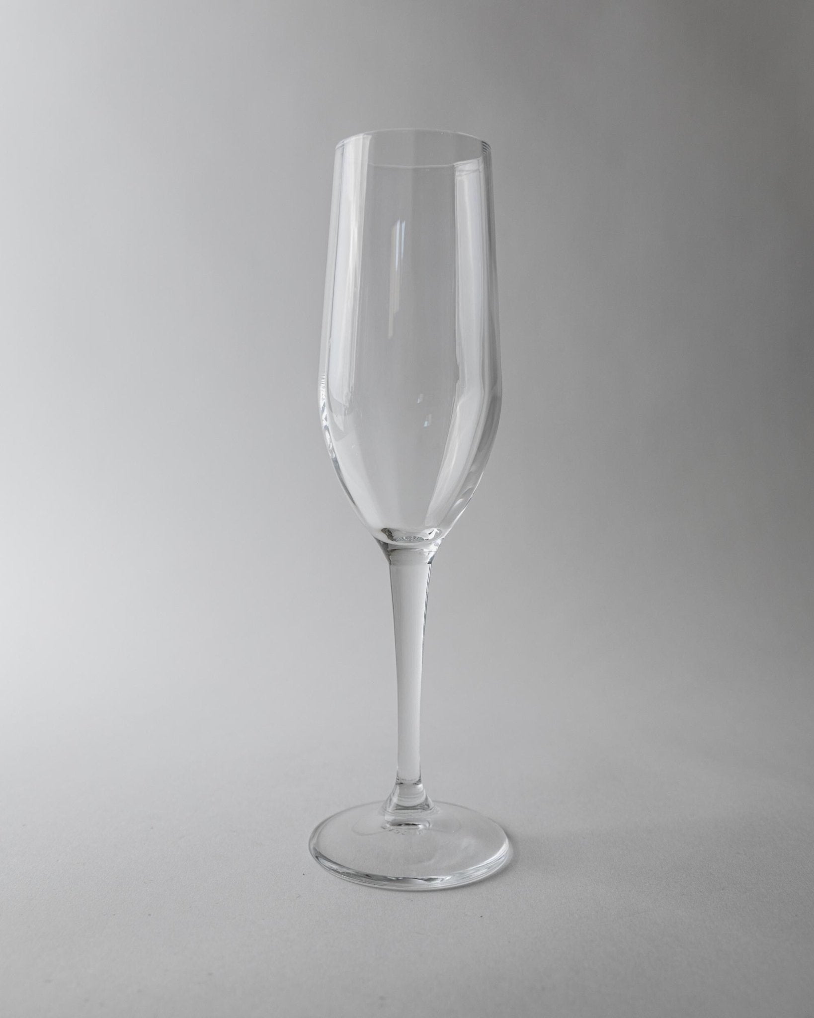 Vintage 1990s Champagne Glasses Set of 7, Clear Glass with Stem and Flute Shape, Elegant Timeless Barware, Retro Table Decor, Gift Idea_Bottega Jacobs