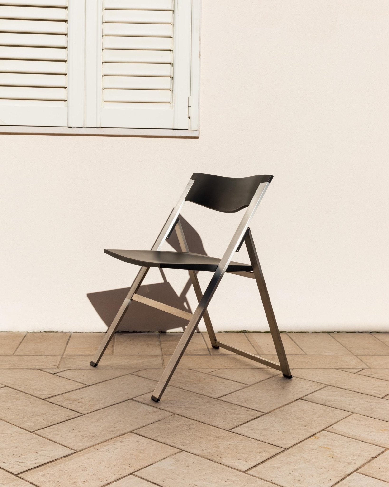 Vintage 1990s Tecno Folding Chair P08, Design by Justus Kolberg, Steel and Black Plastic Construction, Minimal Seating, Modern Design_Bottega Jacobs