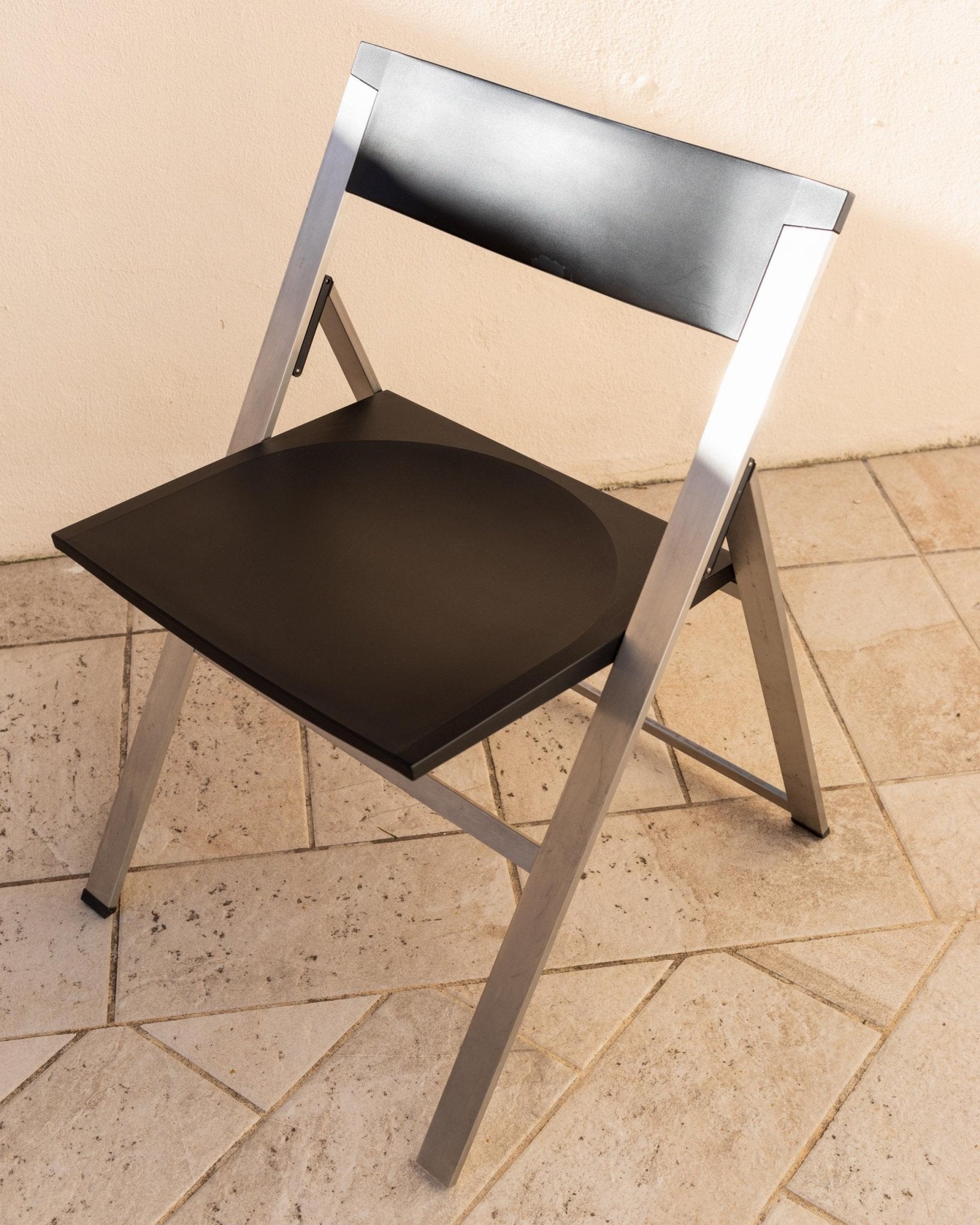 Vintage 1990s Tecno Folding Chair P08, Design by Justus Kolberg, Steel and Black Plastic Construction, Minimal Seating, Modern Design_Bottega Jacobs