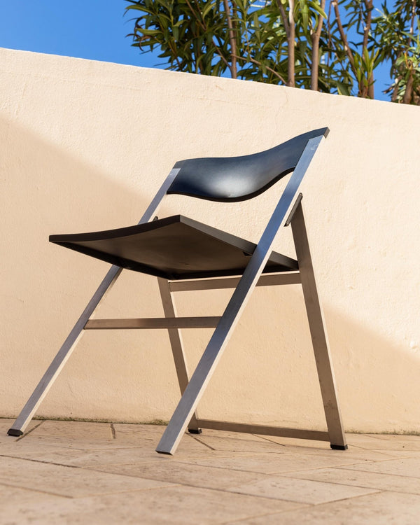 Vintage 1990s Tecno Folding Chair P08, Design by Justus Kolberg, Steel and Black Plastic Construction, Minimal Seating, Modern Design_Bottega Jacobs