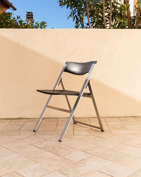 Vintage 1990s Tecno Folding Chair P08, Design by Justus Kolberg, Steel and Black Plastic Construction, Minimal Seating, Modern Design_Bottega Jacobs