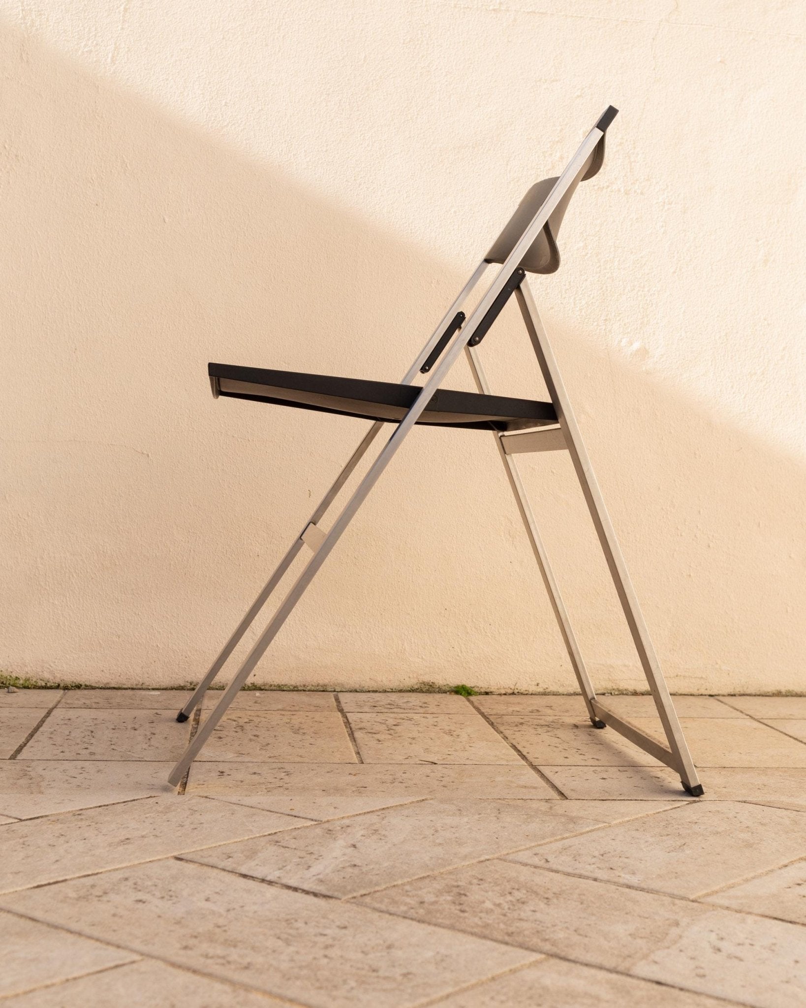 Vintage 1990s Tecno Folding Chair P08, Design by Justus Kolberg, Steel and Black Plastic Construction, Minimal Seating, Modern Design_Bottega Jacobs