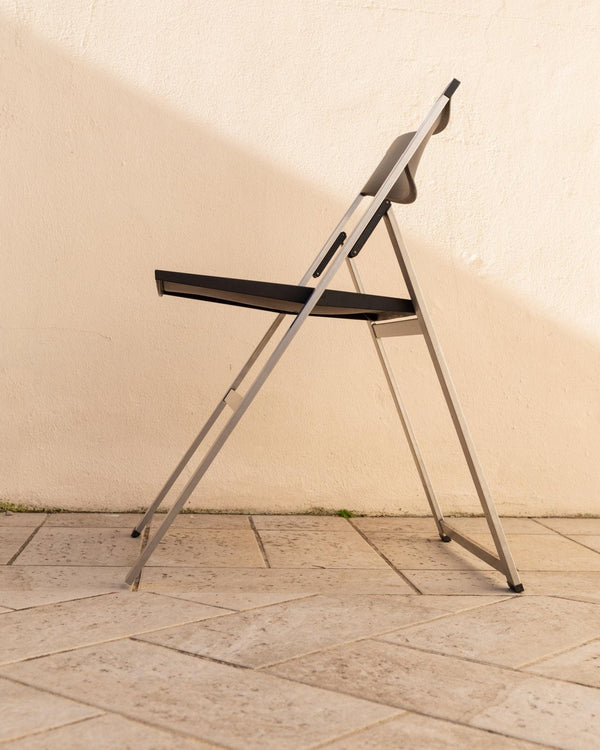Vintage 1990s Tecno Folding Chair P08, Design by Justus Kolberg, Steel and Black Plastic Construction, Minimal Seating, Modern Design_Bottega Jacobs
