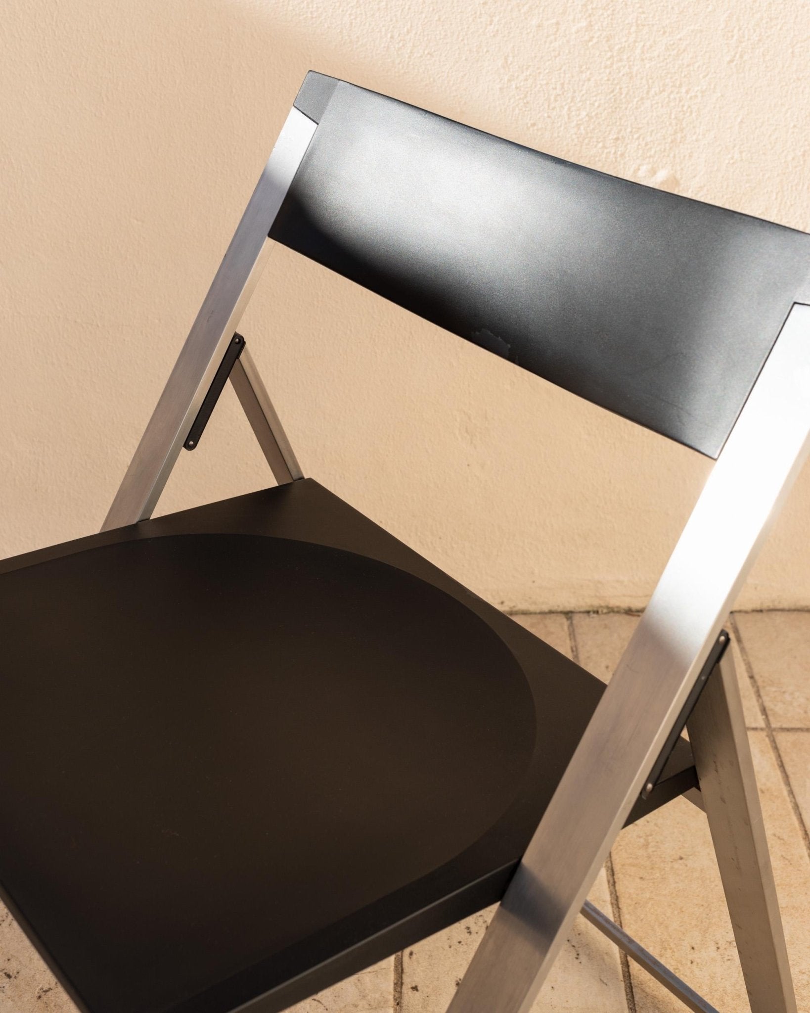 Vintage 1990s Tecno Folding Chair P08, Design by Justus Kolberg, Steel and Black Plastic Construction, Minimal Seating, Modern Design_Bottega Jacobs