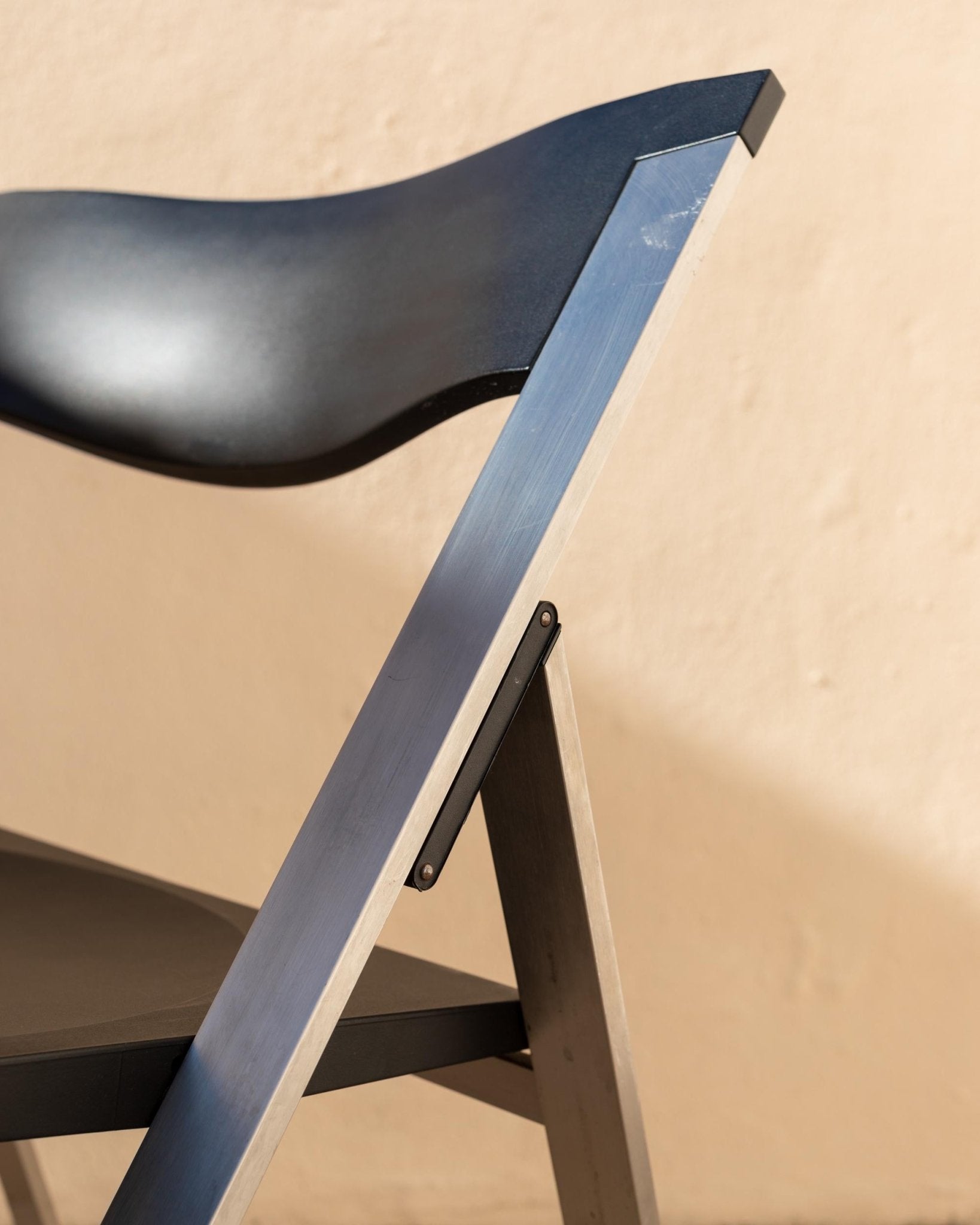 Vintage 1990s Tecno Folding Chair P08, Design by Justus Kolberg, Steel and Black Plastic Construction, Minimal Seating, Modern Design_Bottega Jacobs